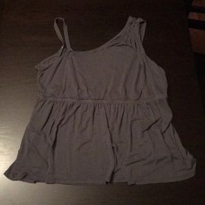 A grey sleeveless blouse